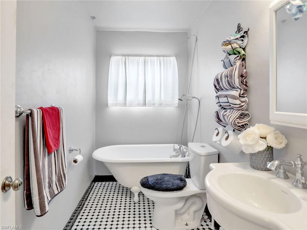 9083 Aster Road Fort Myers, FL 33967 - Photo 20 of 30 a bathroom with a sink toilet and shower