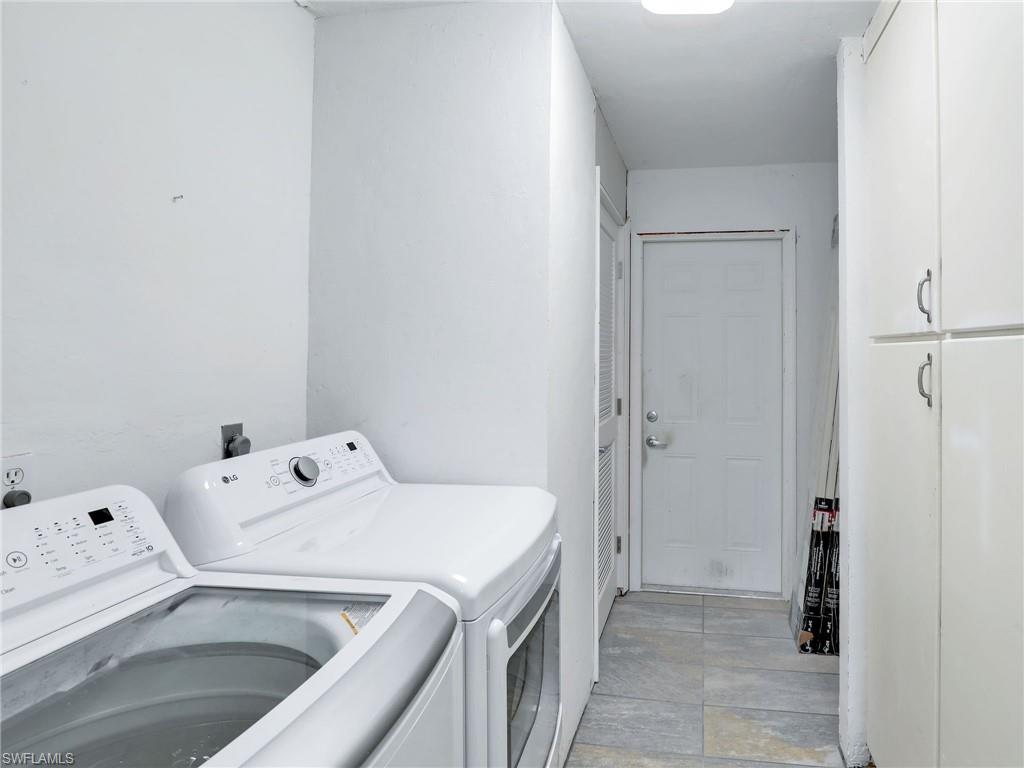 9083 Aster Road Fort Myers, FL 33967 - Photo 22 of 30 a utility room with dryer and washer