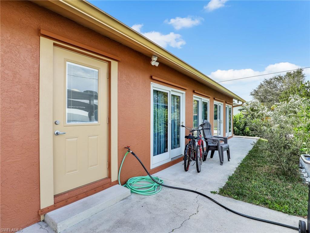9083 Aster Road Fort Myers, FL 33967 - Photo 23 of 30 a view of two chairs in the balcony