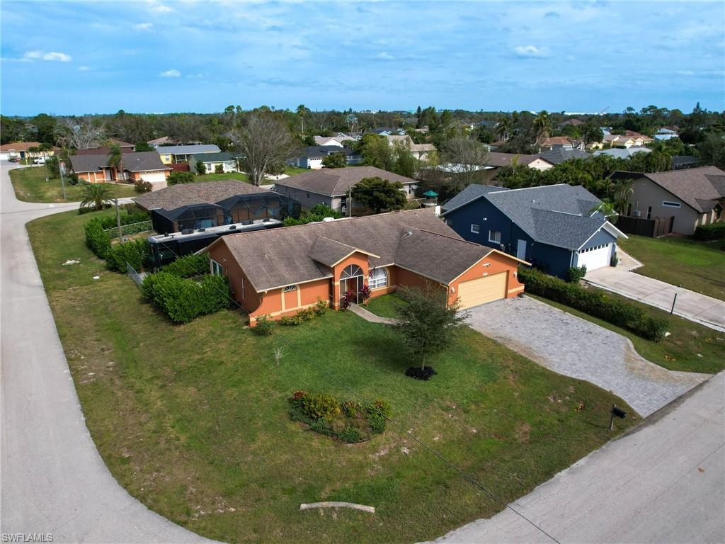 9083 Aster Road Fort Myers, FL 33967 - Photo 27 of 30 an aerial view of residential houses with outdoor space
