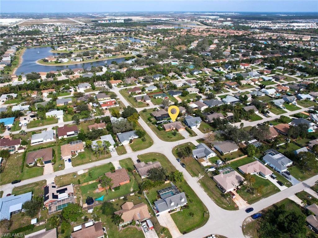 9083 Aster Road Fort Myers, FL 33967 - Photo 30 of 30 an aerial view of residential houses with city view
