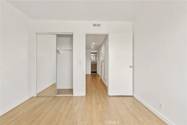 a view of a hallway with staircase