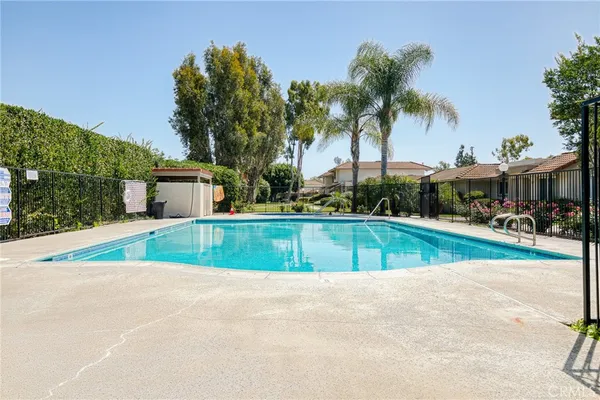 an aerial view of a swimming pool and outdoor space