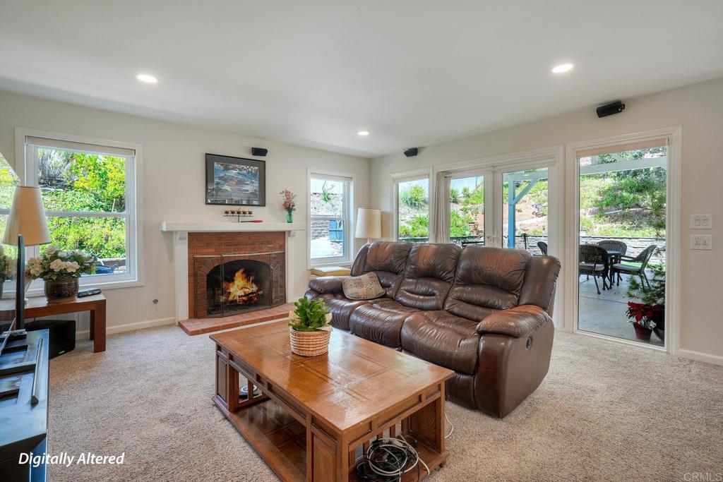 13639 Freeport Road San Diego, CA 92129 - Photo 9 of 44 a living room with furniture and a fireplace