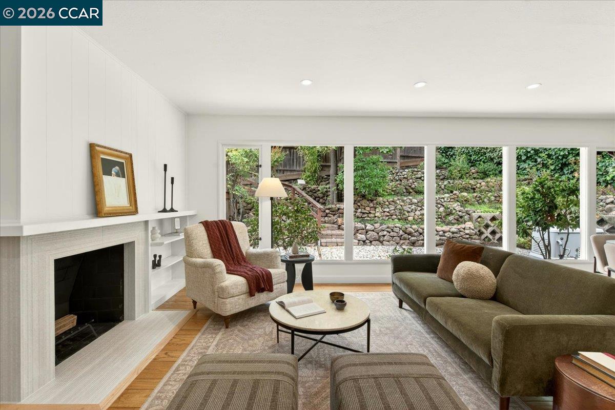 24 Las Vegas Road Orinda, CA 94563 - Photo 6 of 47 a living room with furniture and a fireplace