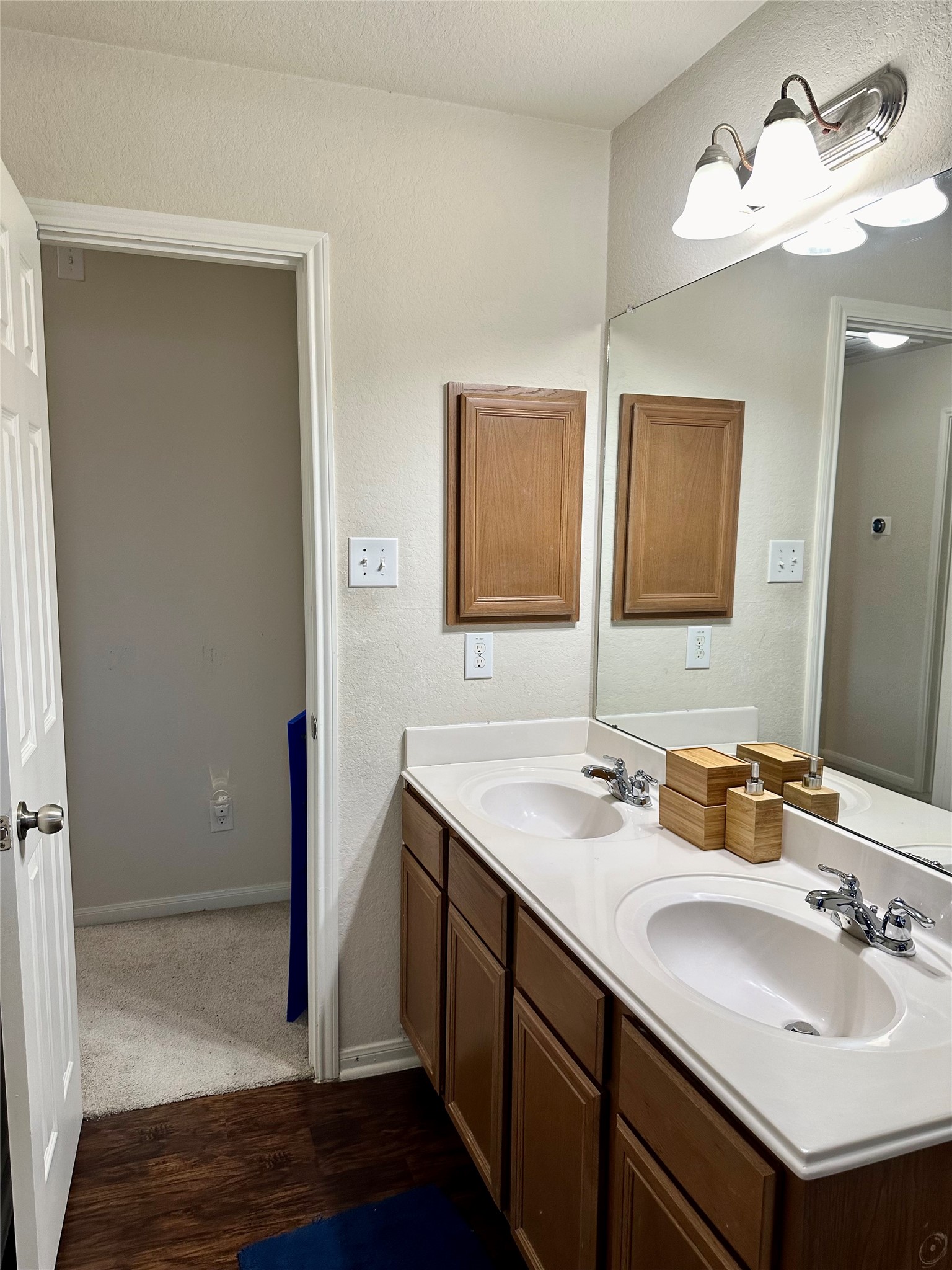 18622 Each Elm Way Houston, TX 77084 - Photo 17 of 35 a bathroom with a sink and a mirror