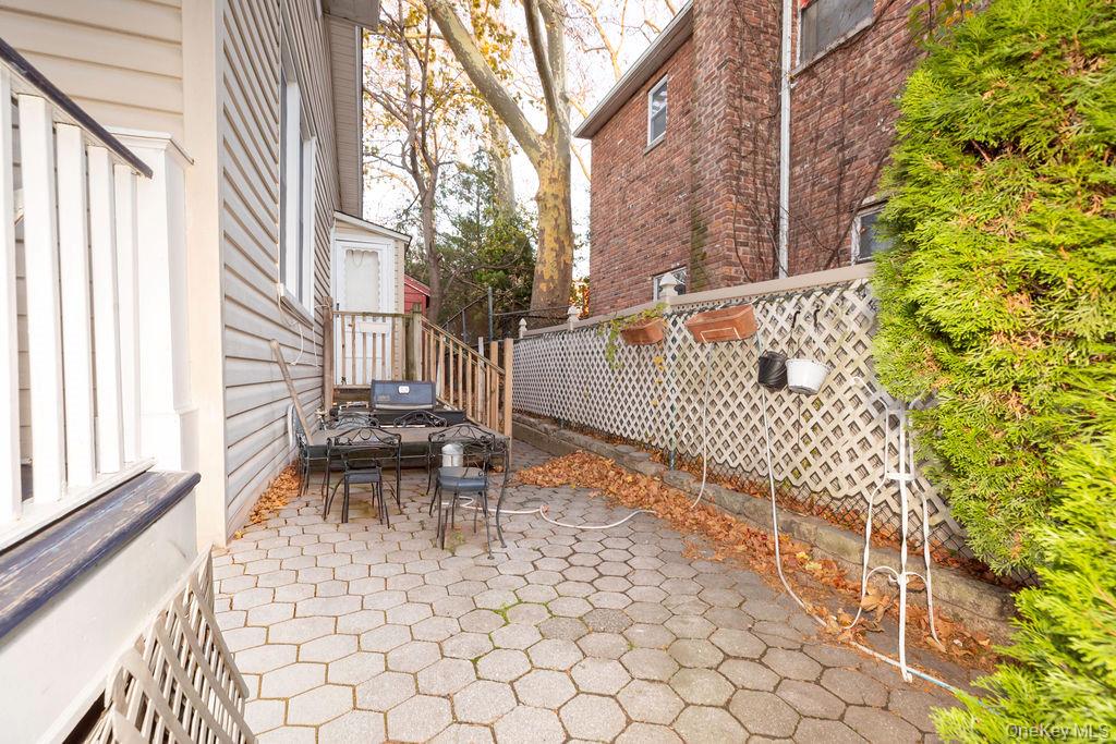 104 Fordham Street, Unit 5 Bronx, NY 10464 - Photo 23 of 27 a balcony with table and chairs