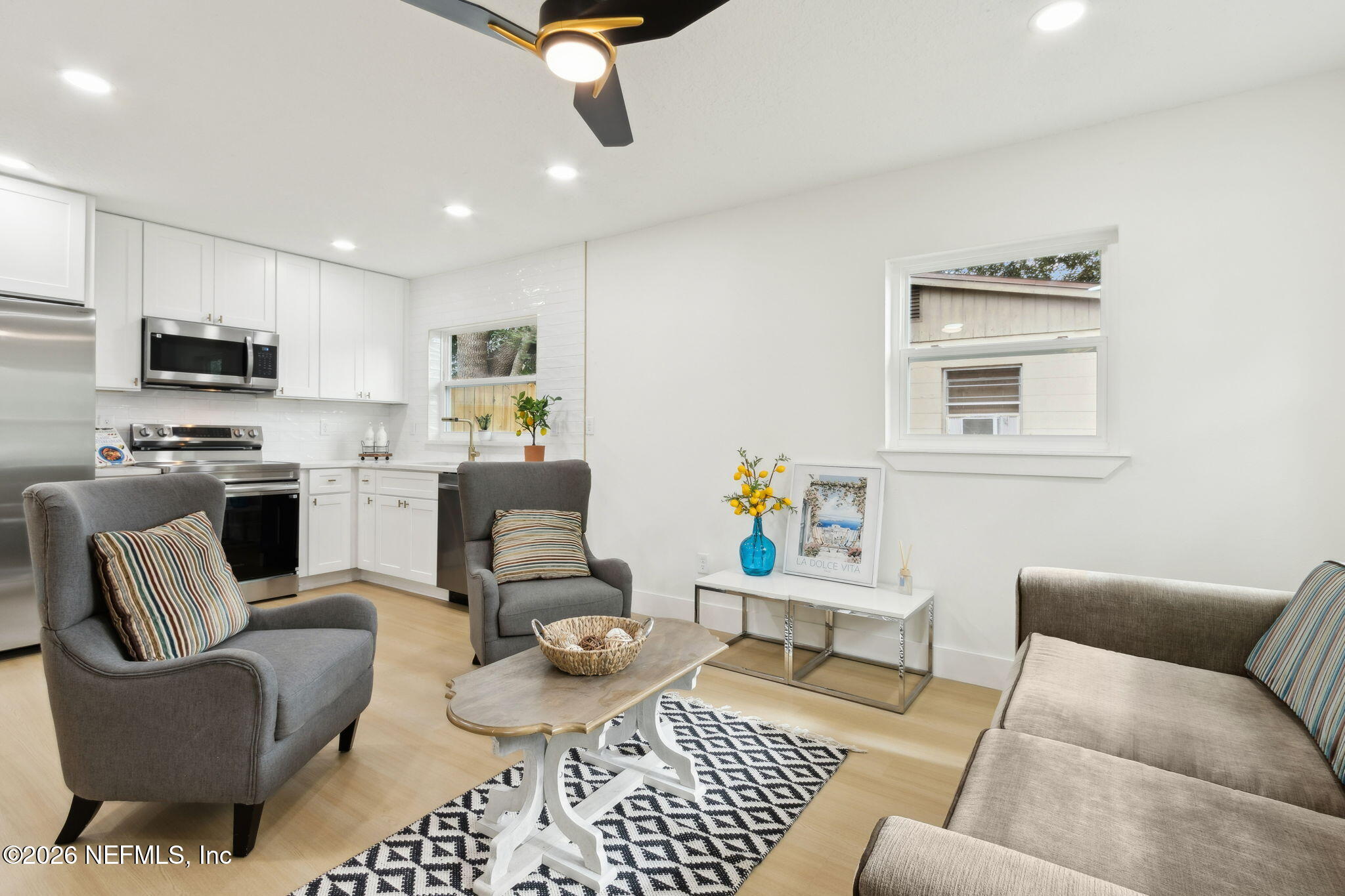 14051 Claridge Road North Jacksonville, FL 32250 - Photo 11 of 43 a living room with furniture and a window