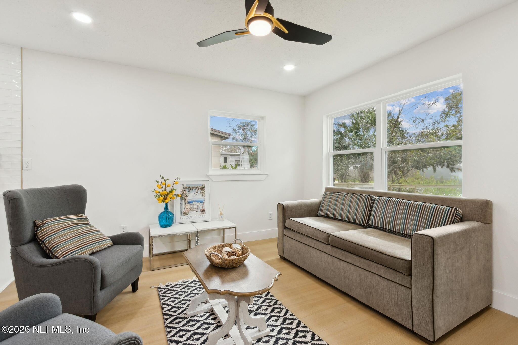 14051 Claridge Road North Jacksonville, FL 32250 - Photo 12 of 43 a living room with furniture and a window