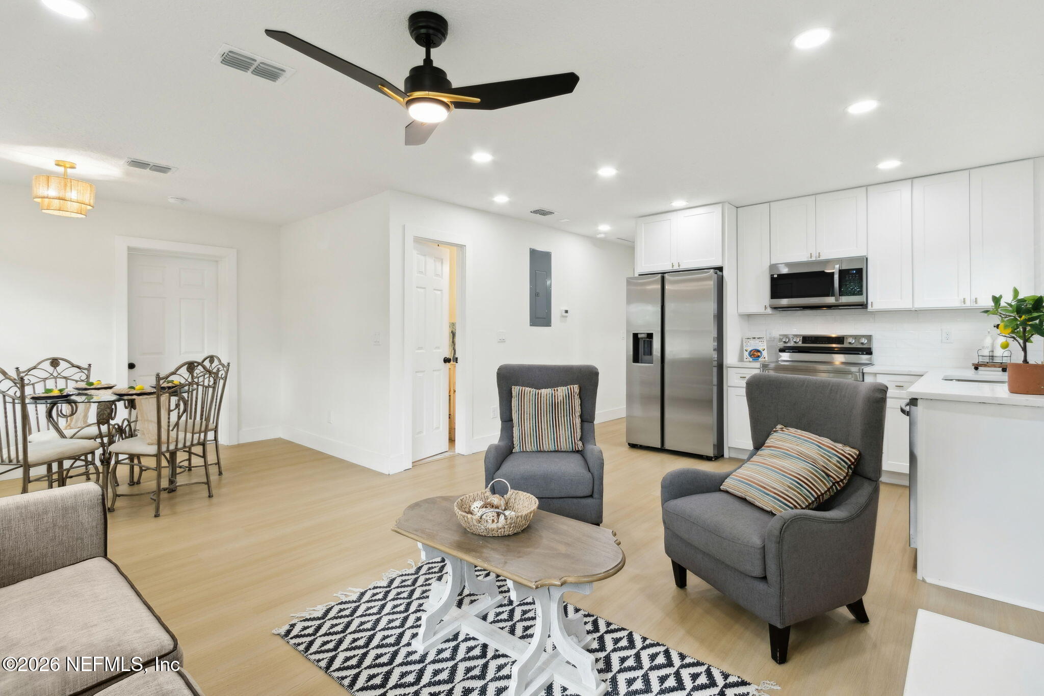 14051 Claridge Road North Jacksonville, FL 32250 - Photo 13 of 43 a living room with furniture and a view of kitchen