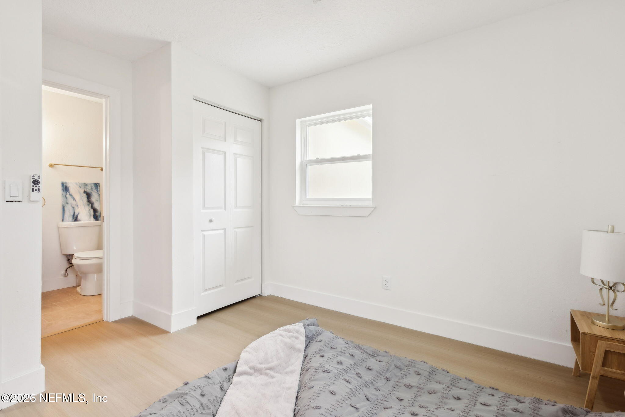 14051 Claridge Road North Jacksonville, FL 32250 - Photo 19 of 43 a bedroom with a bed and a window