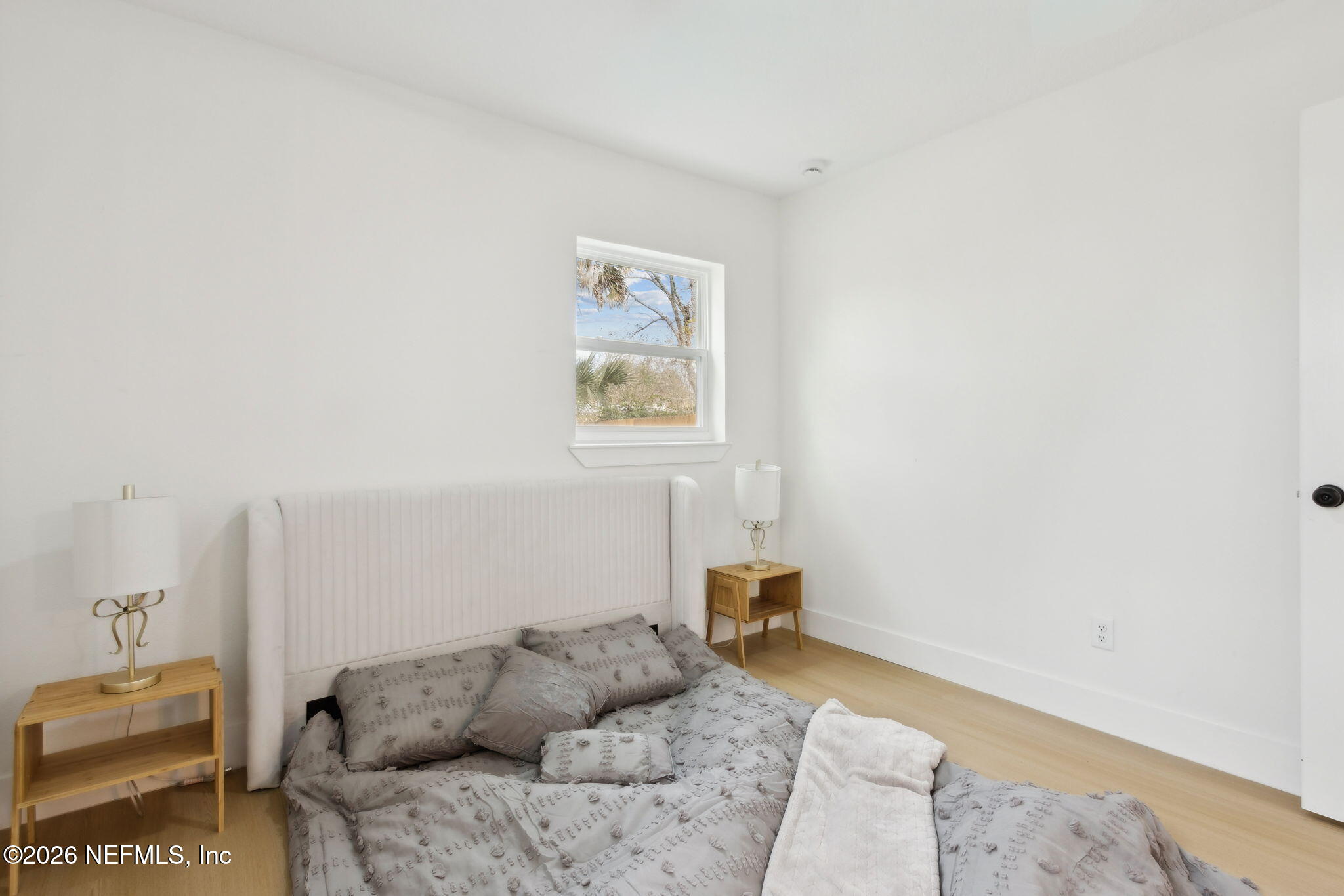 14051 Claridge Road North Jacksonville, FL 32250 - Photo 21 of 43 a bedroom with a bed and a couch