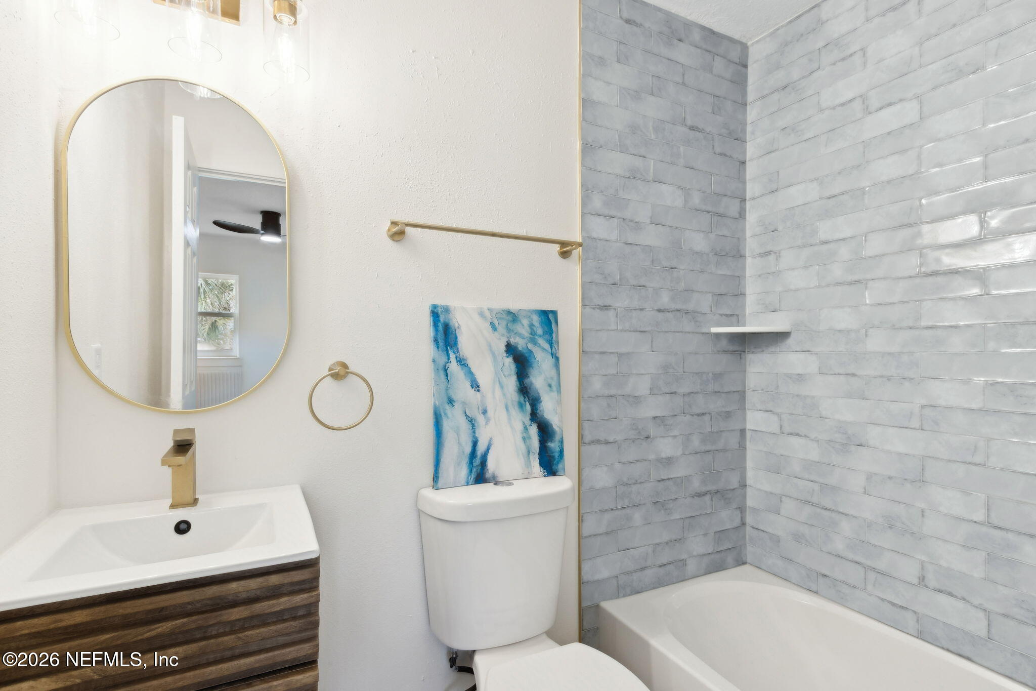 14051 Claridge Road North Jacksonville, FL 32250 - Photo 22 of 43 a bathroom with a sink a toilet and shower