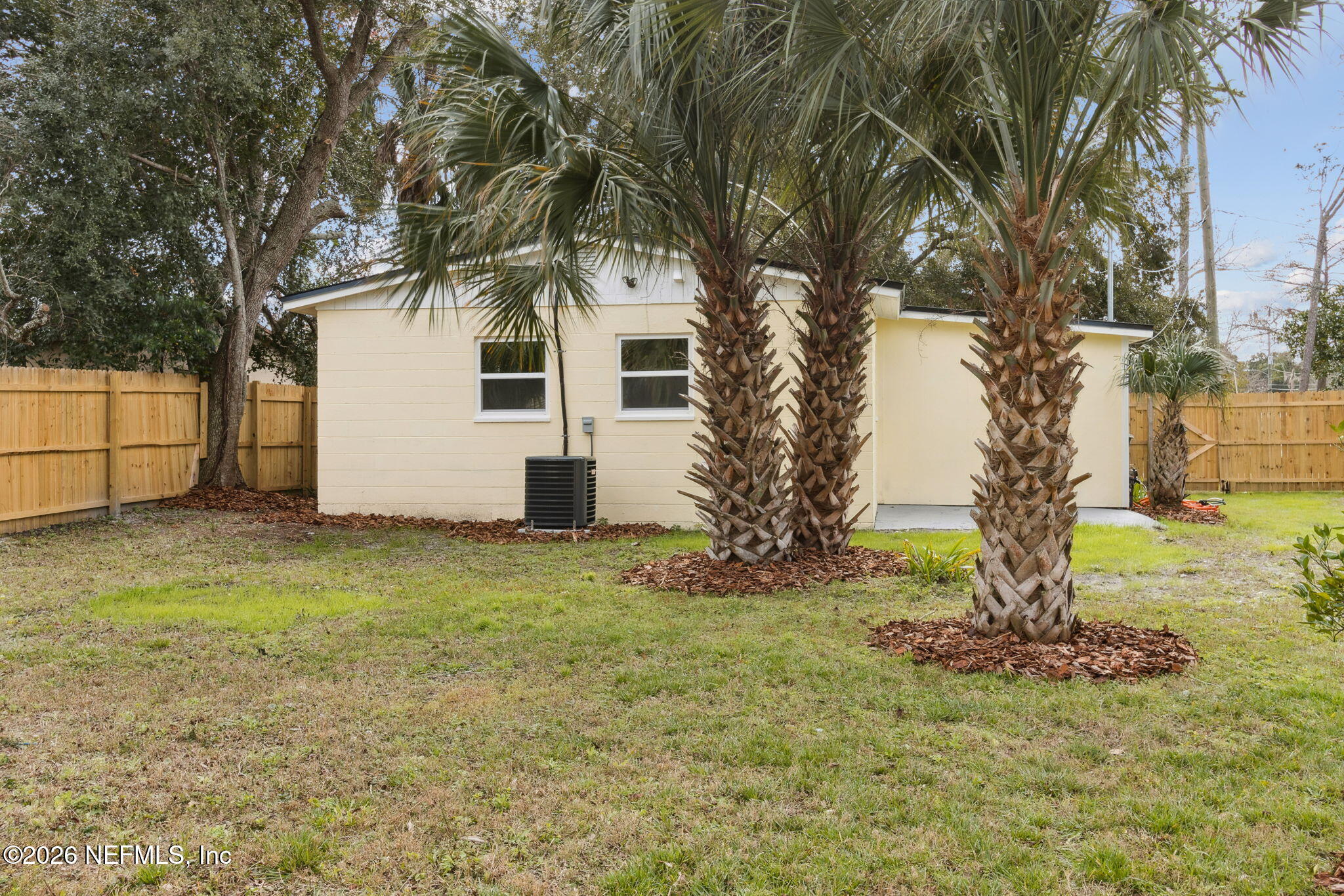 14051 Claridge Road North Jacksonville, FL 32250 - Photo 29 of 43 a white house that has a tree in front of it