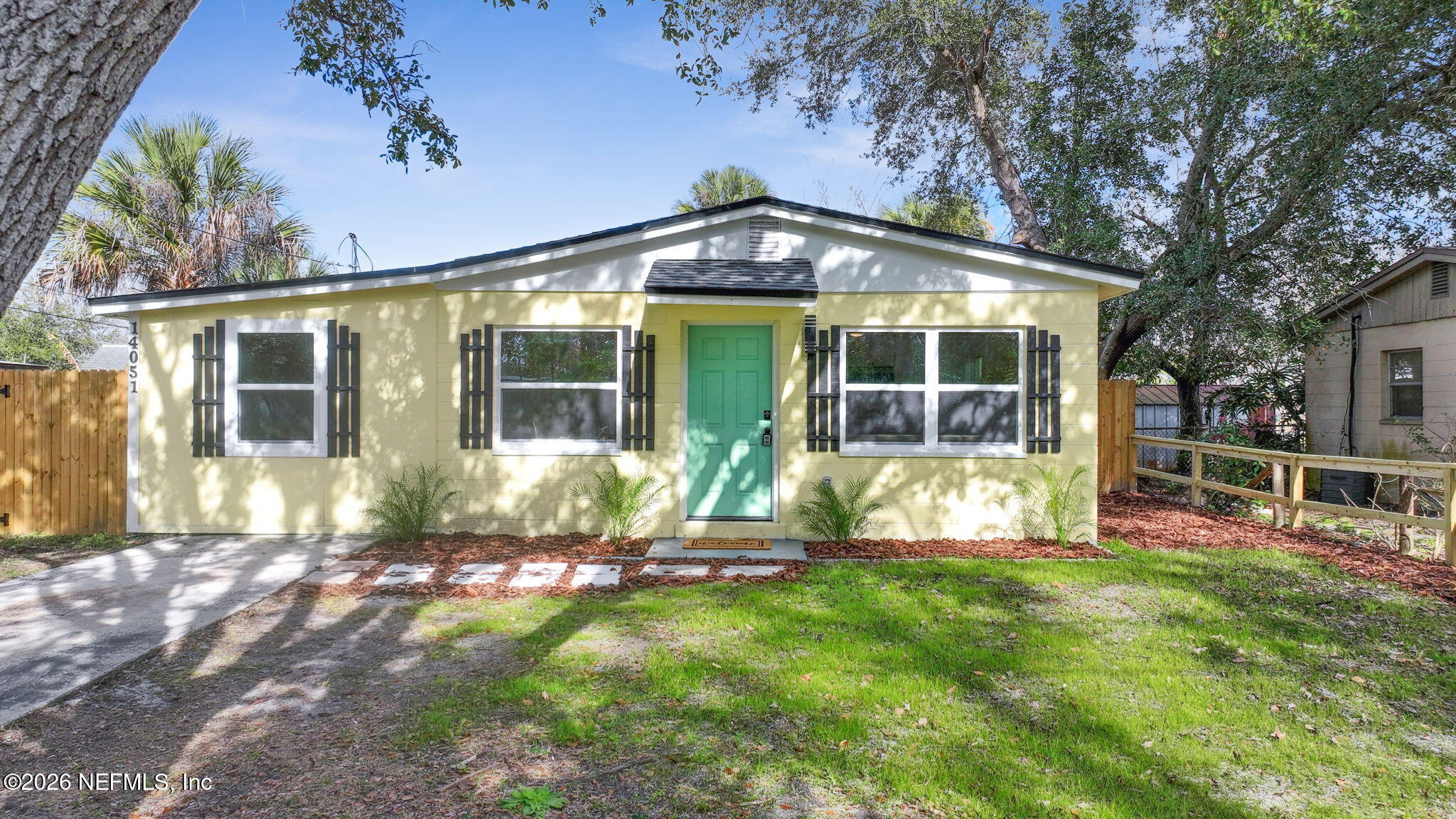 14051 Claridge Road North Jacksonville, FL 32250 - Photo 37 of 43 front view of a house with a yard