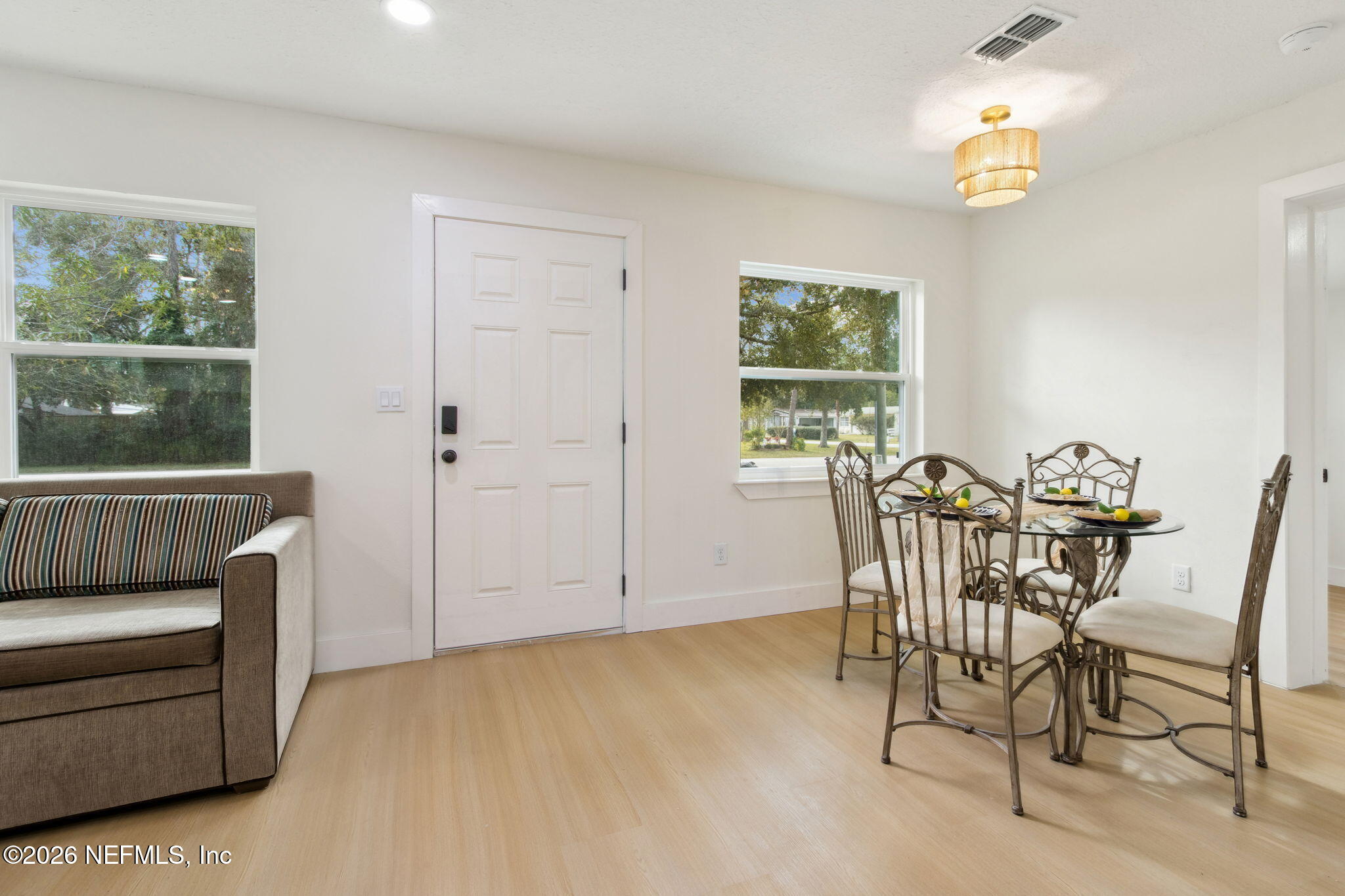 14051 Claridge Road North Jacksonville, FL 32250 - Photo 7 of 43 a view of a dining room with furniture window and outside view