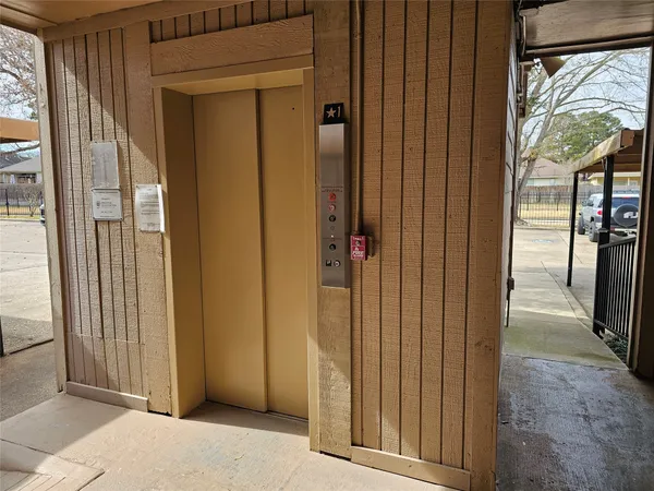 a view of a balcony with a door