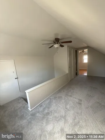 a view of a room with an empty space