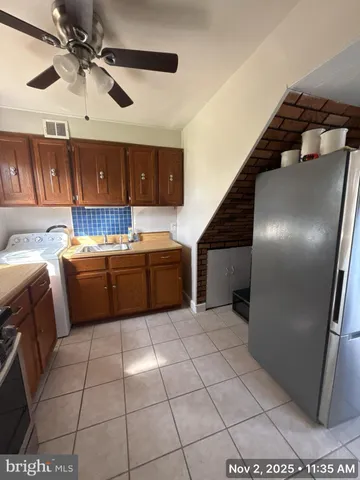 a utility room with washer and dryer
