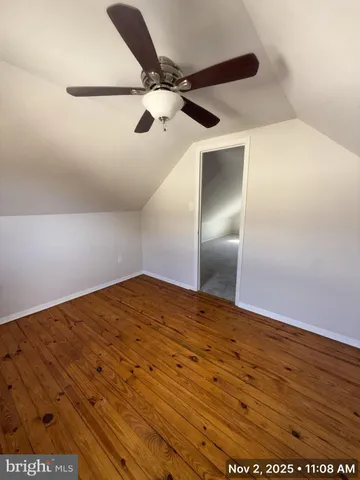 a view of a big room with wooden floor