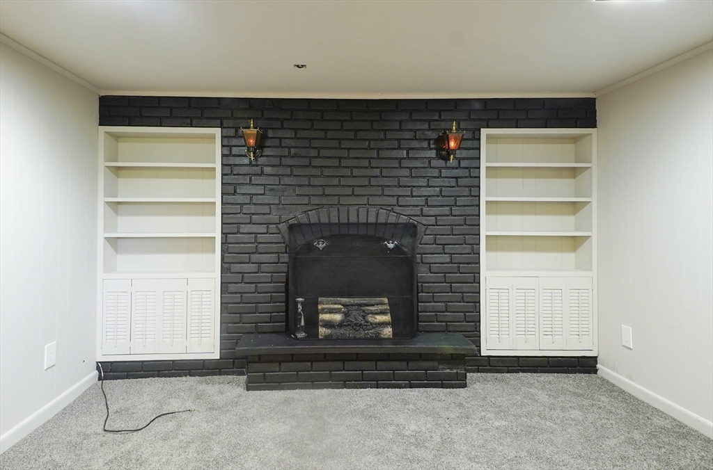 102 McCarthy Avenue Chicopee, MA 01020 - Photo 18 of 18 a room with a fireplace