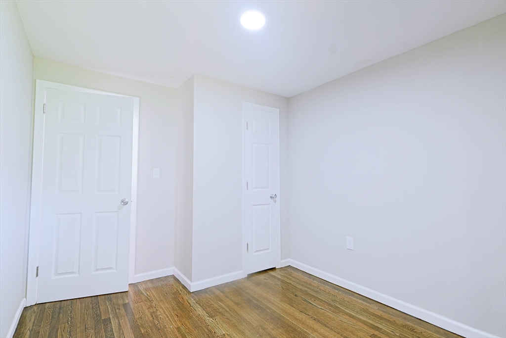102 McCarthy Avenue Chicopee, MA 01020 - Photo 9 of 18 a view of room with wooden floor