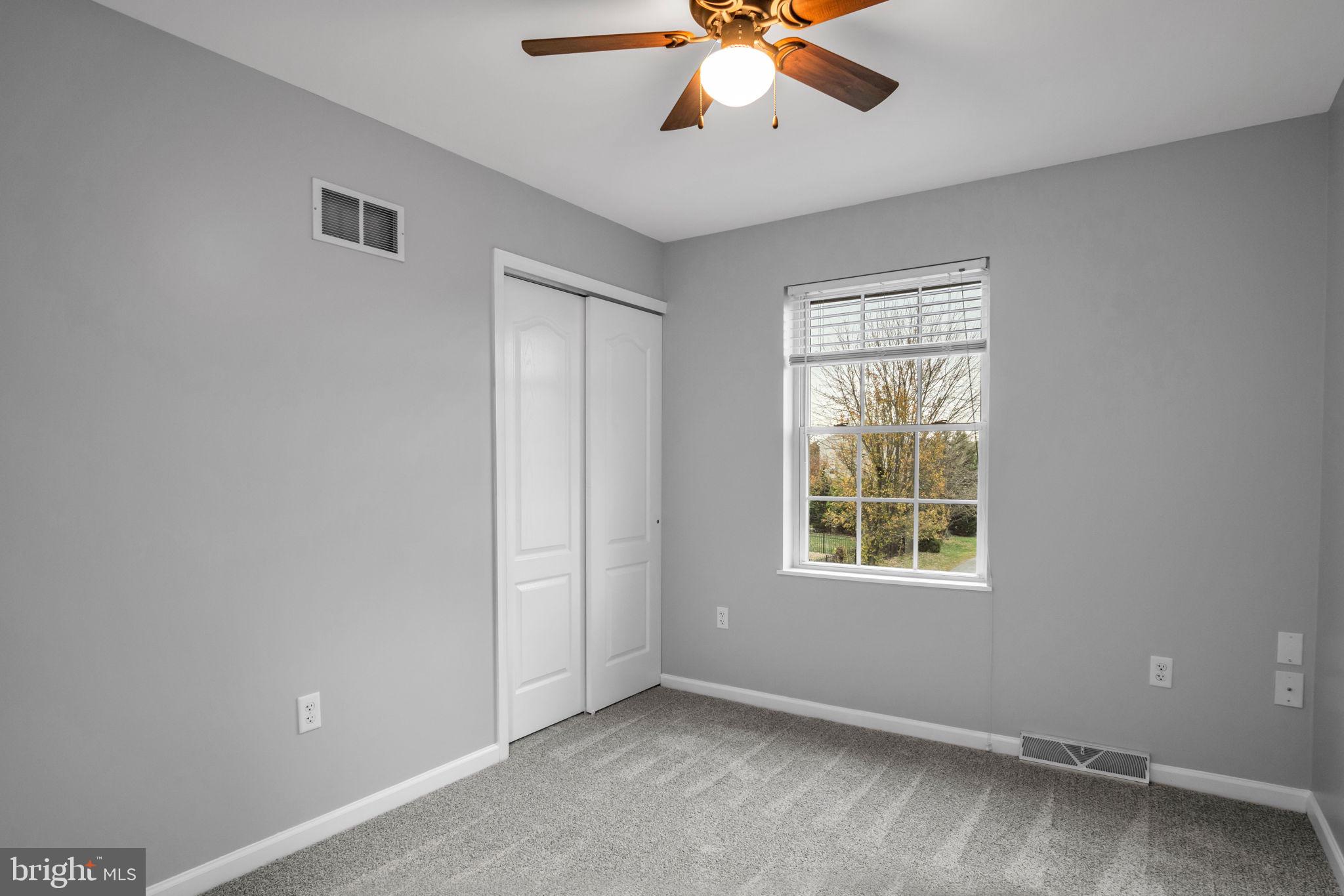 2 Sue Circle Lebanon, PA 17042 - Photo 14 of 32 an empty room with a window and a fan