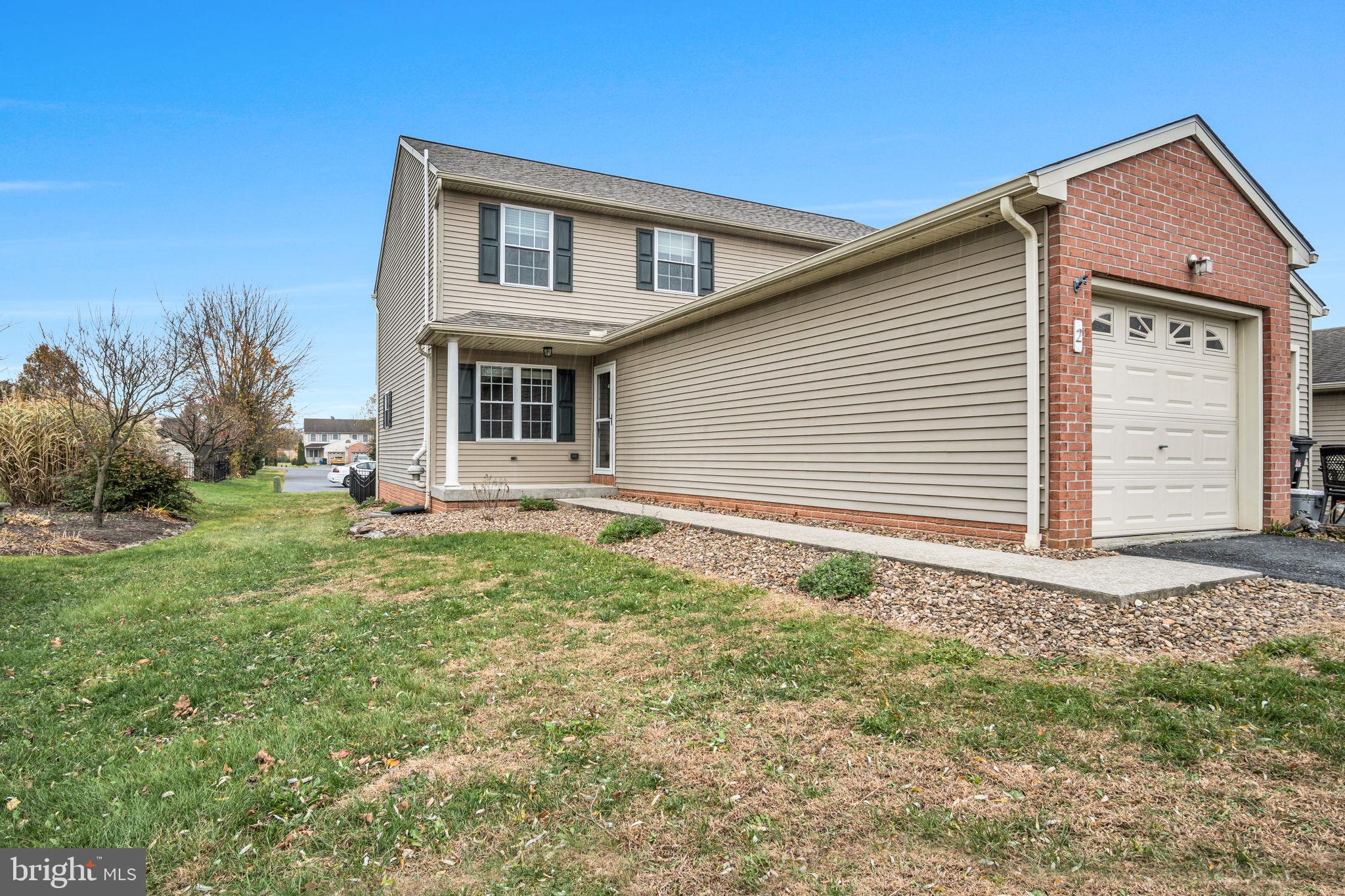 2 Sue Circle Lebanon, PA 17042 - Photo 2 of 32 a front view of a house with garden
