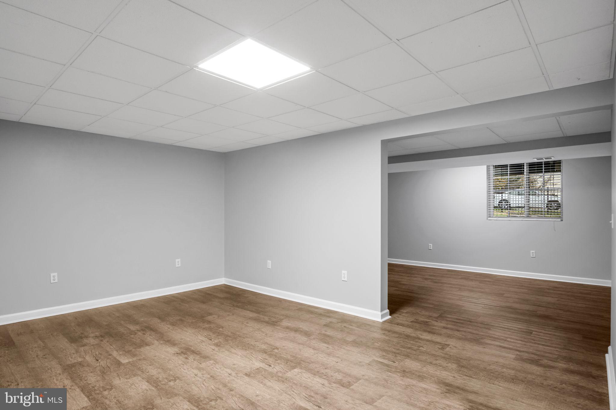 2 Sue Circle Lebanon, PA 17042 - Photo 23 of 32 an empty room with wooden floor and windows