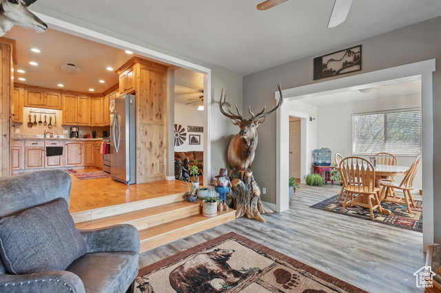 2490 South State Street Springville, UT 84663 - Photo 23 of 38 Living area with ceiling fan, recessed lighting, light wood-style flooring, and baseboards