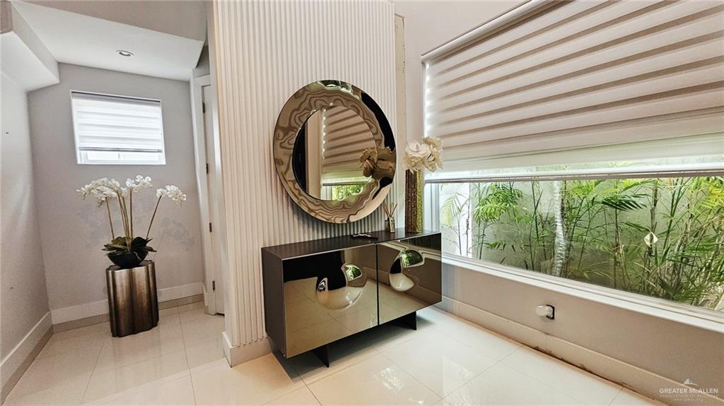 2213 South 48th Street McAllen, TX 78503 - Photo 5 of 28 a living room with furniture and a large window