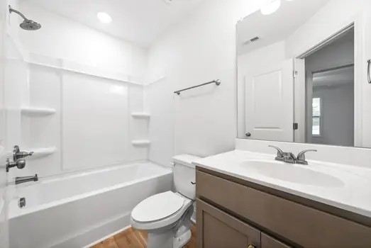 940 Britton Springs Road, Unit 301 Clarksville, TN 37042 - Photo 25 of 30 a bathroom with a sink a toilet and a bathtub