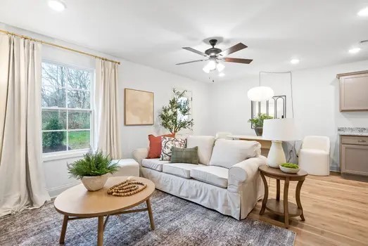 940 Britton Springs Road, Unit 301 Clarksville, TN 37042 - Photo 8 of 30 a living room with furniture and a large window