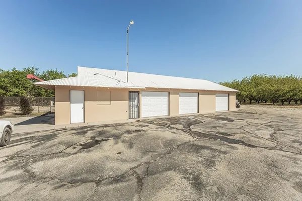 a view of street with parked cars