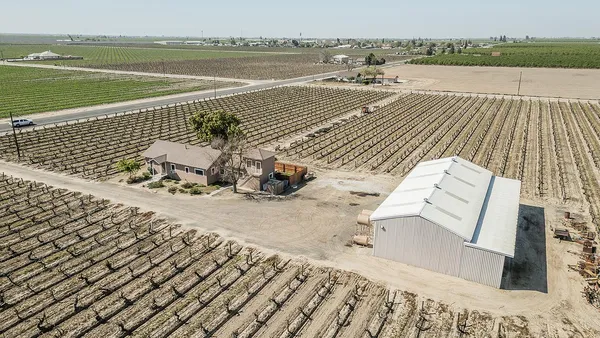 a view of a backyard of the house