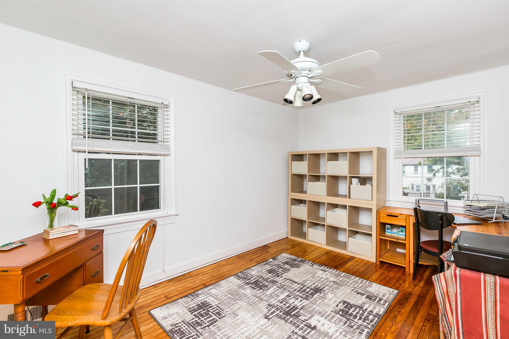 613 Deepdene Road Baltimore, MD 21210 - Photo 16 of 25 a view of a workspace with furniture and a window