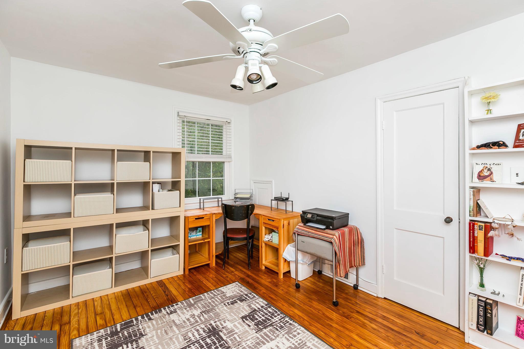 613 Deepdene Road Baltimore, MD 21210 - Photo 17 of 25 a view of a workspace with furniture and wooden floor