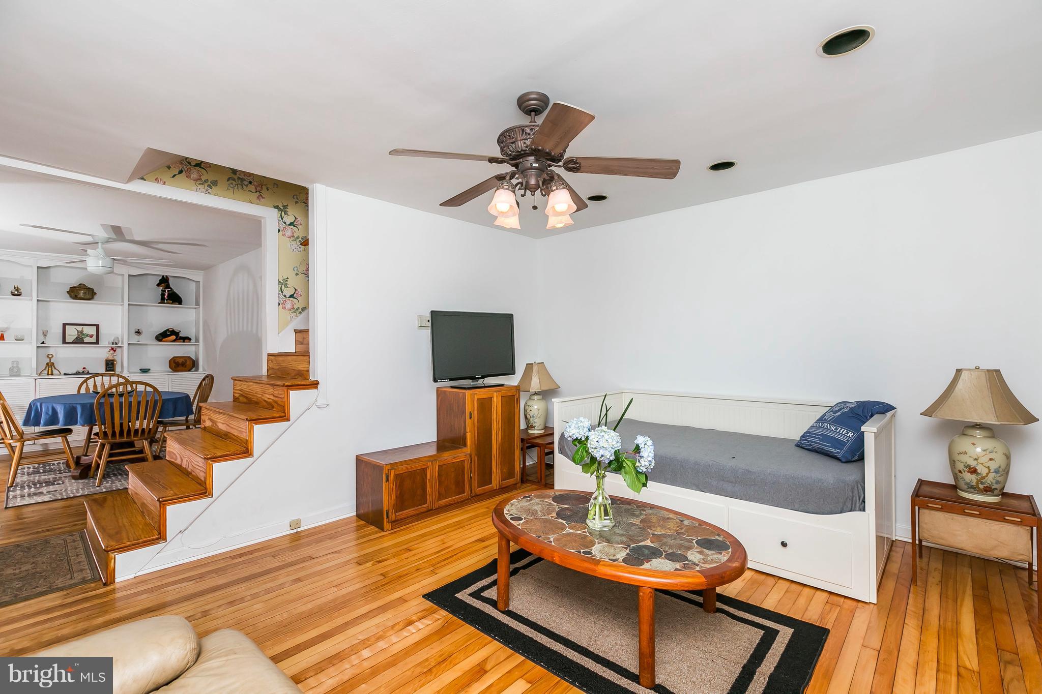 613 Deepdene Road Baltimore, MD 21210 - Photo 4 of 25 a living room with furniture and a wooden floor