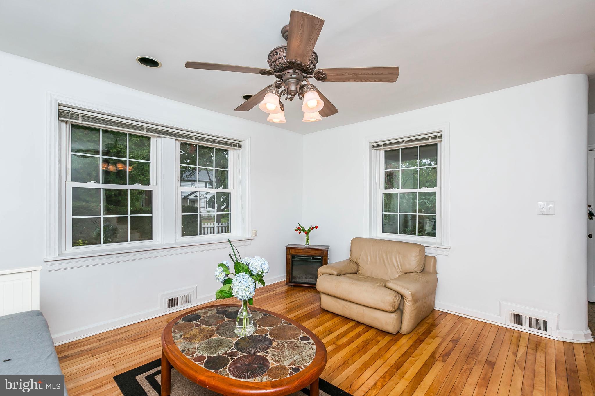 613 Deepdene Road Baltimore, MD 21210 - Photo 5 of 25 a living room with furniture and a window
