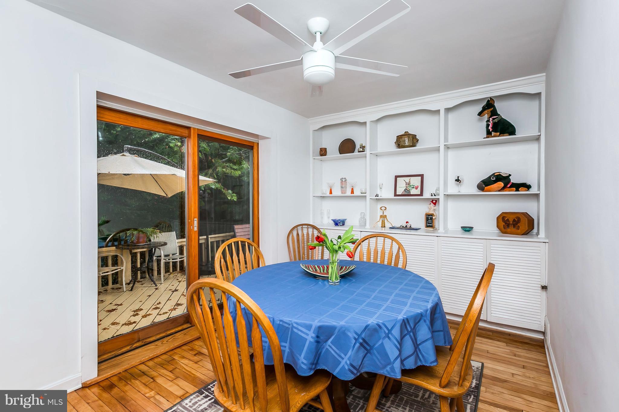 613 Deepdene Road Baltimore, MD 21210 - Photo 7 of 25 a dining room with furniture and a window