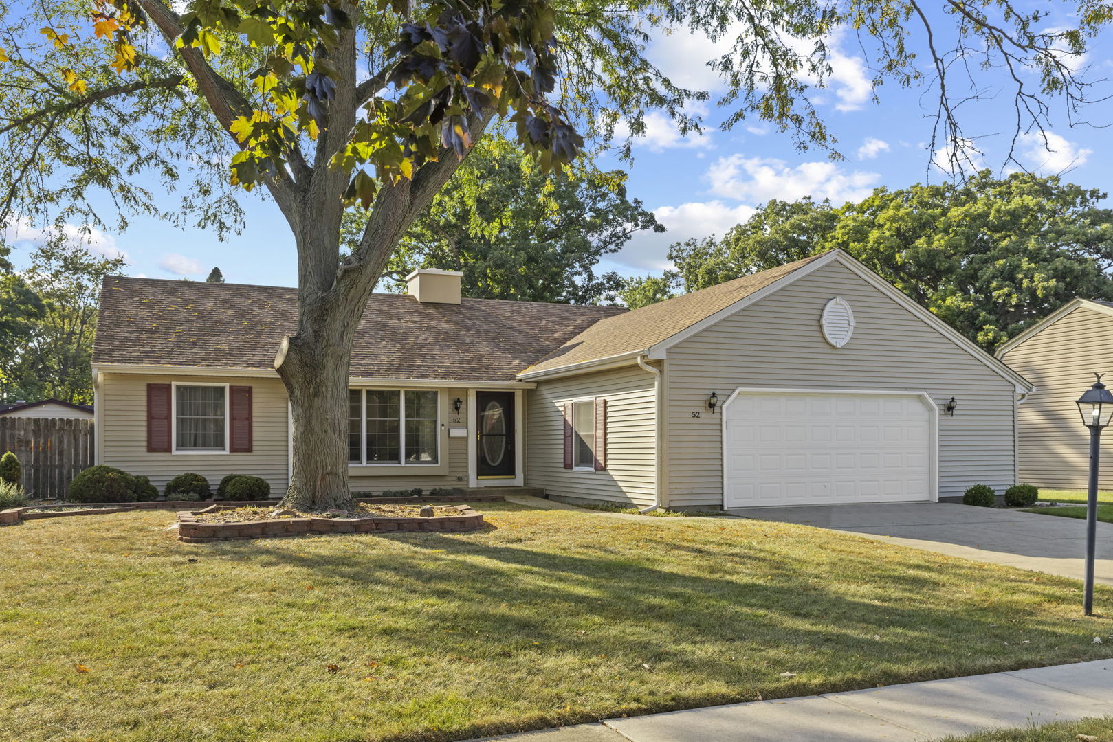 52 Winrock Road Montgomery, IL 60538 - Photo 1 of 28 a house view with a outdoor space