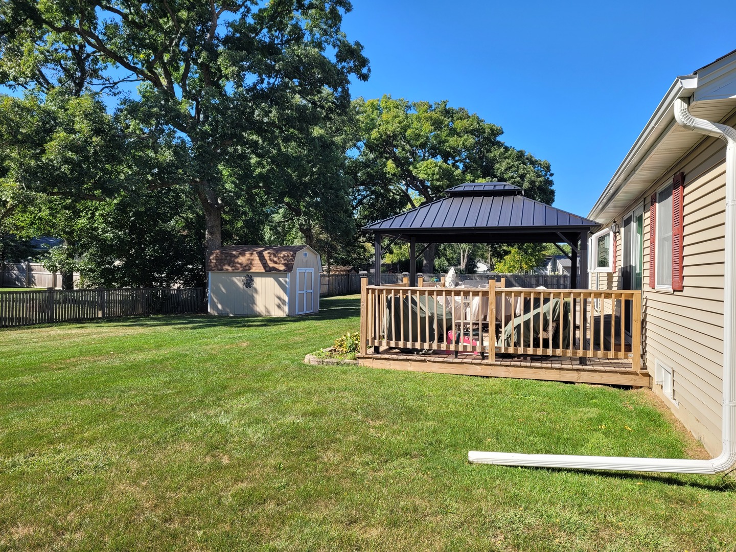 52 Winrock Road Montgomery, IL 60538 - Photo 25 of 28 a view of a house with a yard and a porch