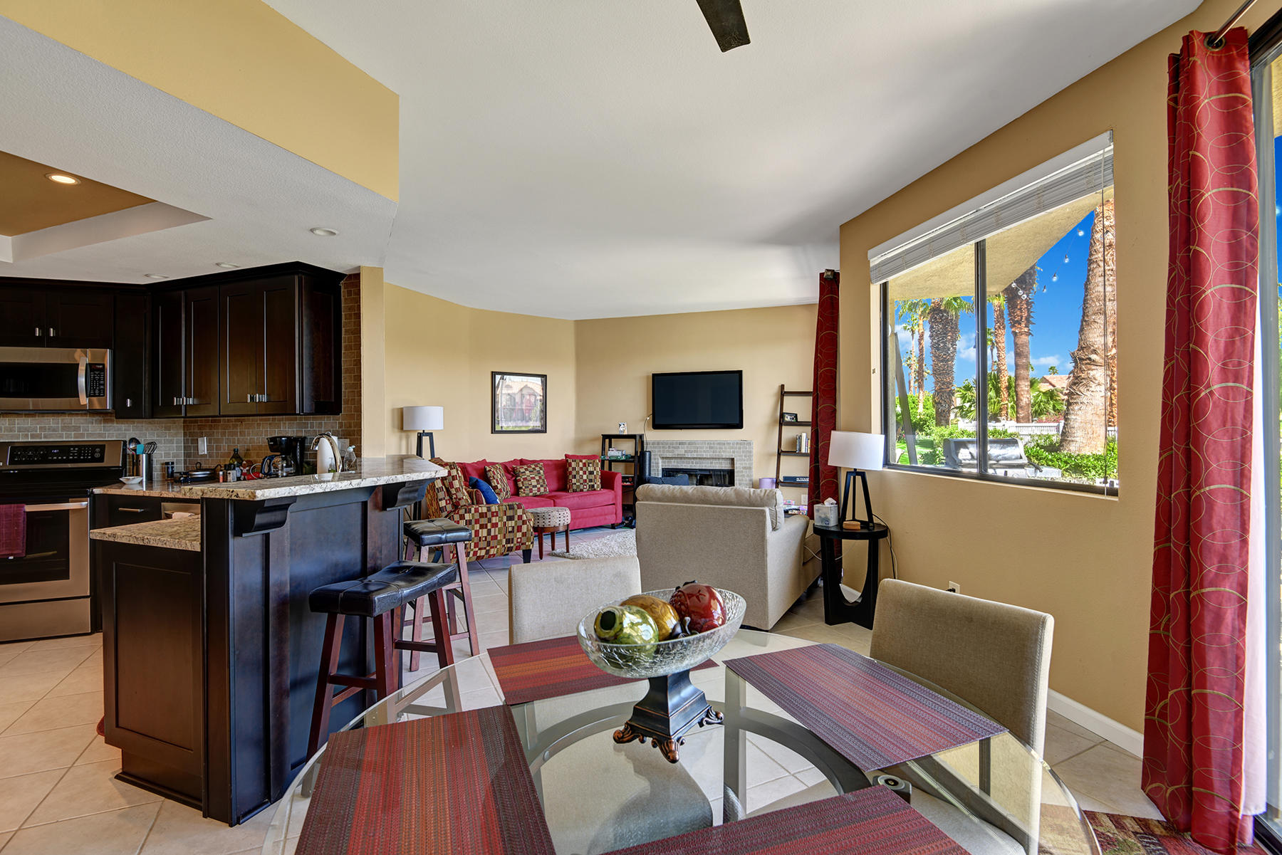 55108 Firestone La Quinta, CA 92253 - Photo 5 of 26 a living room with furniture and a flat screen tv