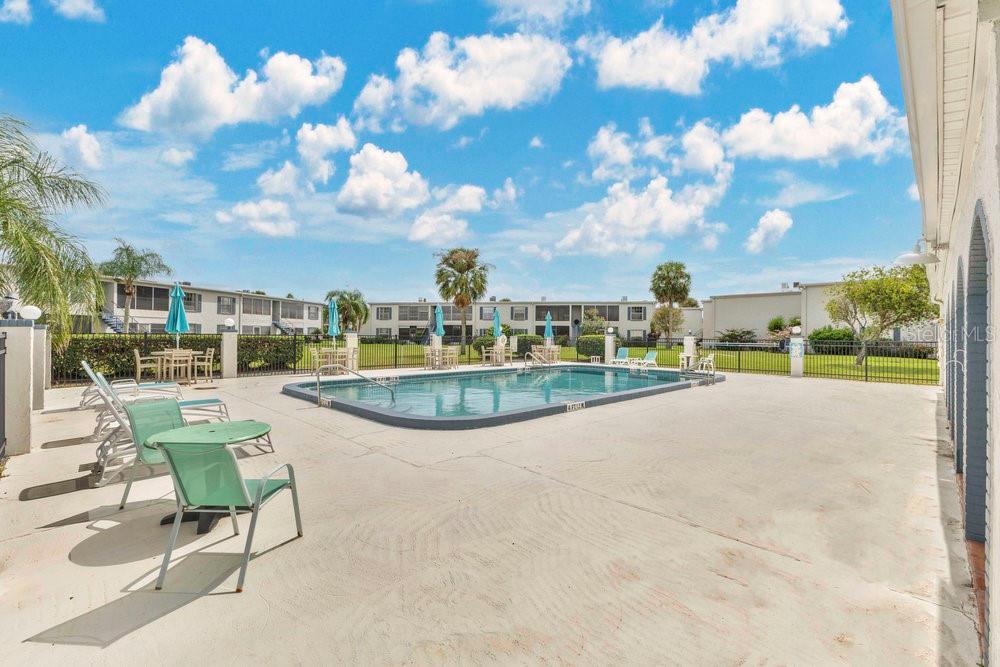 1024 North Plantation Drive, Unit B9 Kissimmee, FL 34741 - Photo 19 of 28 a view of a lake with a house