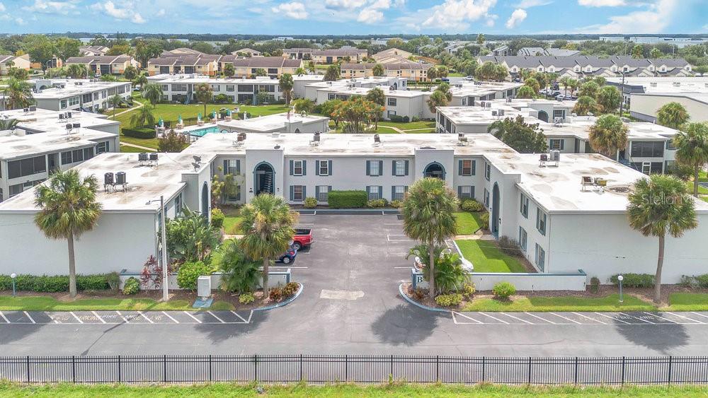 1024 North Plantation Drive, Unit B9 Kissimmee, FL 34741 - Photo 20 of 28 a view of multiple houses with a yard