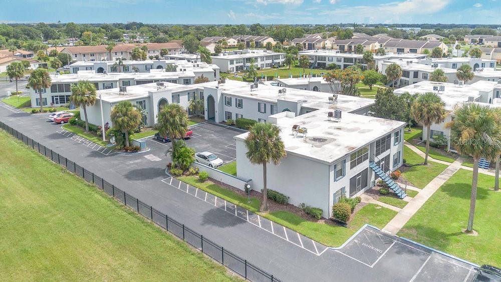 1024 North Plantation Drive, Unit B9 Kissimmee, FL 34741 - Photo 21 of 28 an aerial view of a house with a big yard