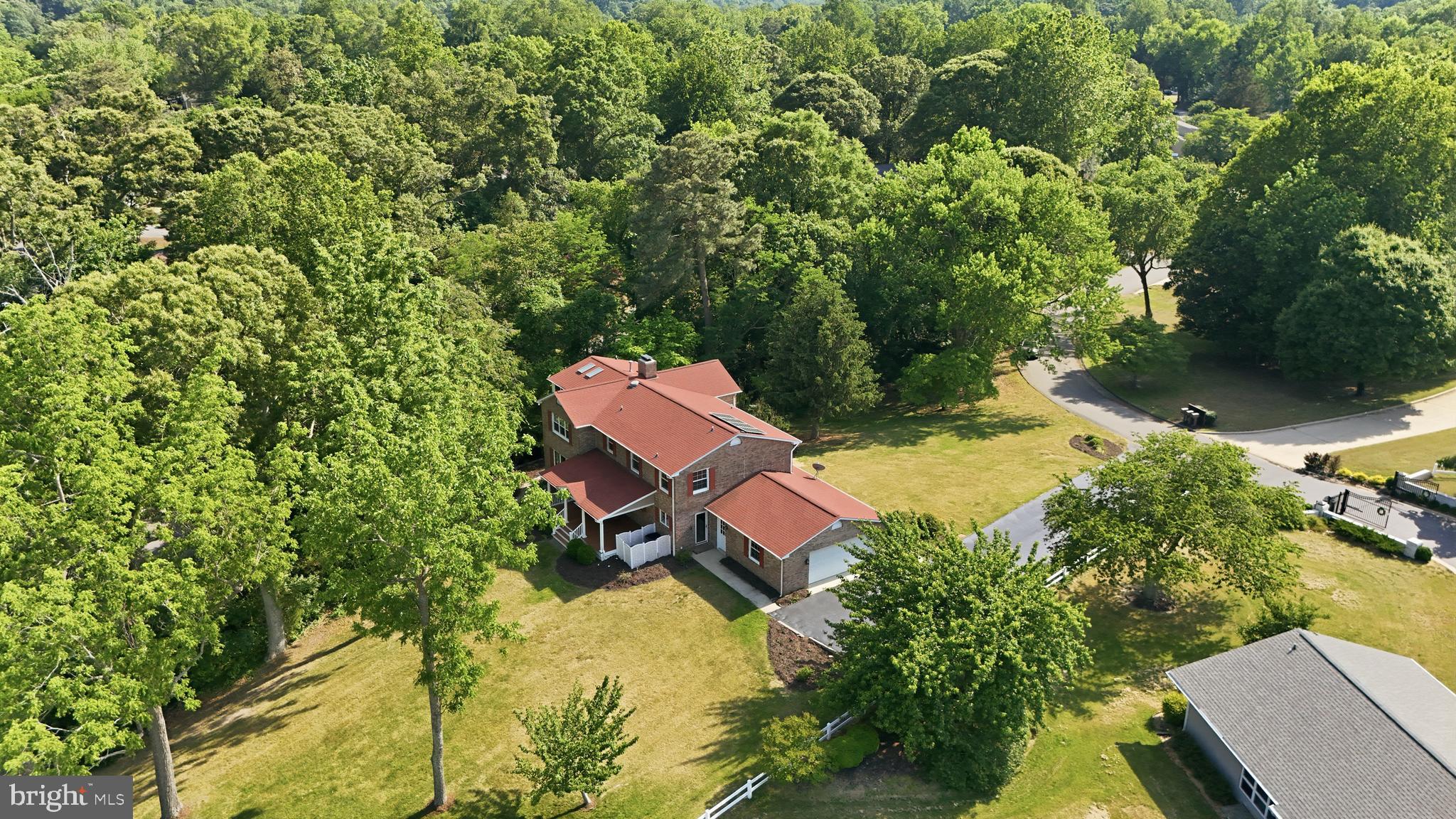 23500 River Road Lexington Park, MD 20653 - Photo 8 of 92 an aerial view of a house with swimming pool and garden