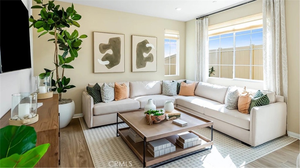 1678 Phantom Lane Rialto, CA 92376 - Photo 4 of 18 a living room with furniture and a potted plant