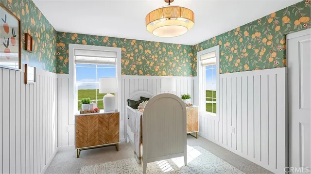 a view of living room with furniture and a large window