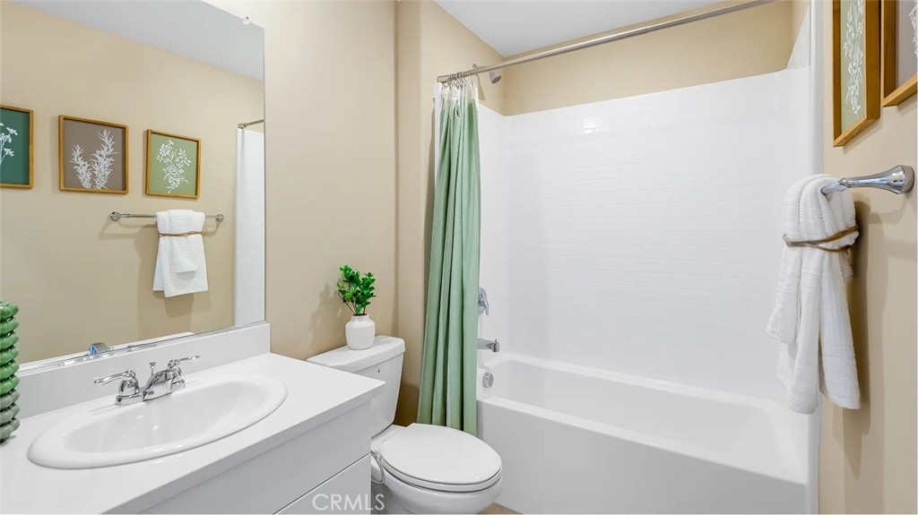 1678 Phantom Lane Rialto, CA 92376 - Photo 6 of 18 a bathroom with a sink toilet and shower